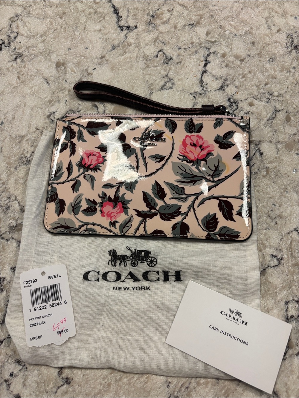Coach Floral Patent Leather Wristlet in Blush and Pink